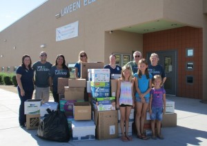 Crosswalk Church Members deliver boxes of uniforms to Laveen School